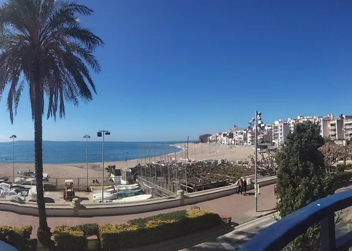 Beachfront Apartment With Private Parking